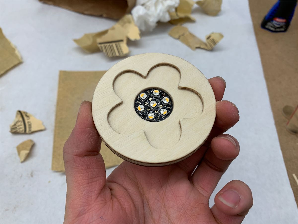 the neopixel jewel secured at the rim of the hole