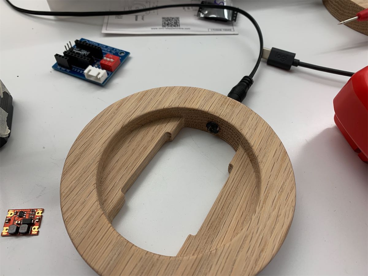 a hole is drilled to fit in the power port